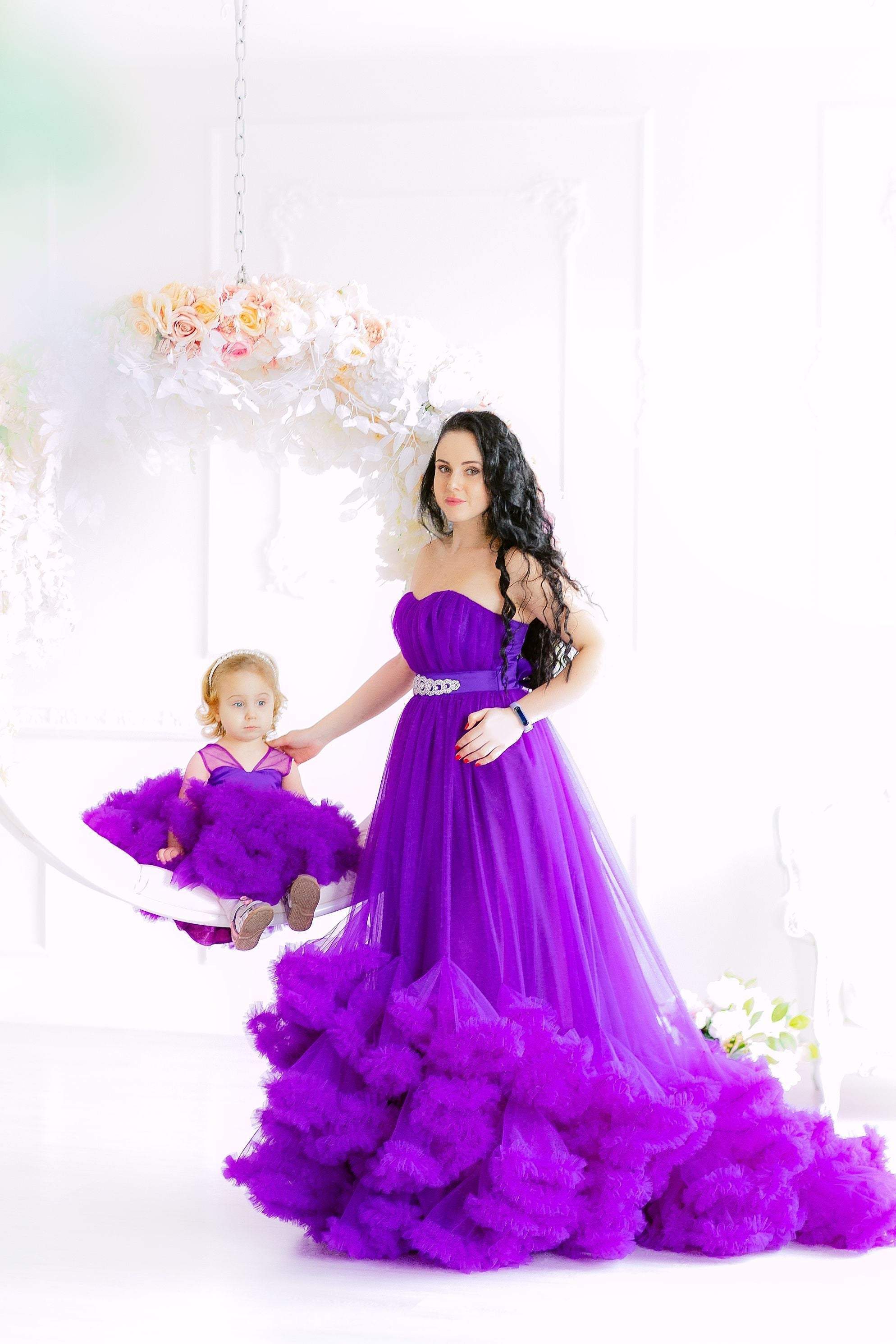https://www.matchinglook.com/cdn/shop/products/purple-ruffle-matching-dress-photoshoot-dress-matching-ball-gowns-baby-girl-dress-princess-dress-mommy-and-me-dress-sheer-tulle-gown-matchinglook-981948@2x.jpg?v=1627882316